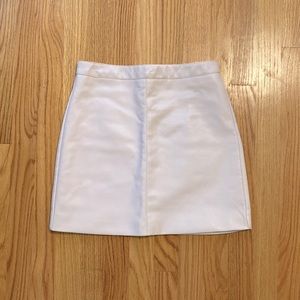 Faux leather pale pink mini skirt from PRICELESS. Size - S